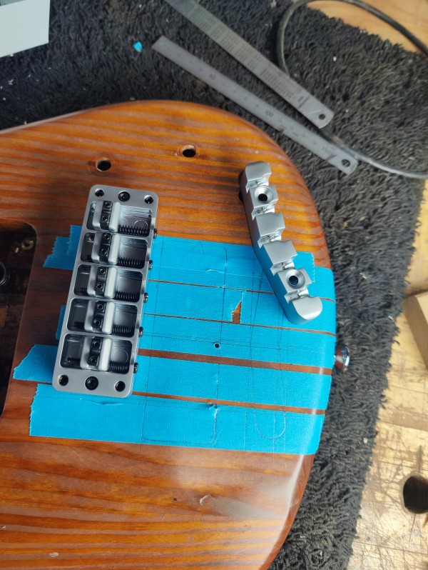 A stack of mahogany neck blanks await machining